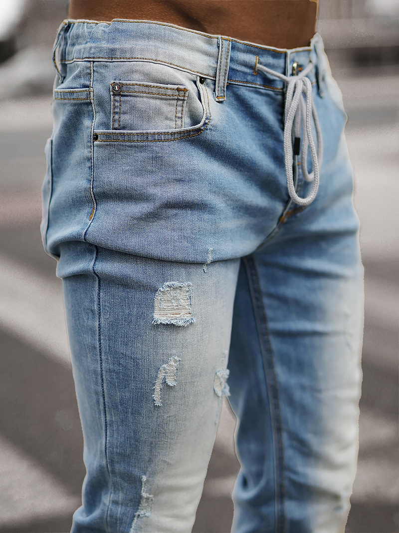 Spodnie jeansowe męskie jasno-niebieskie OZONEE NB/MP0016BCZ