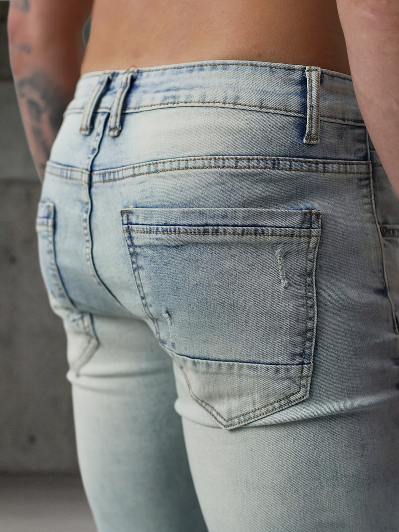 Spodnie jeansowe męskie slim fit jasno-niebieskie OZONEE O/EM8889