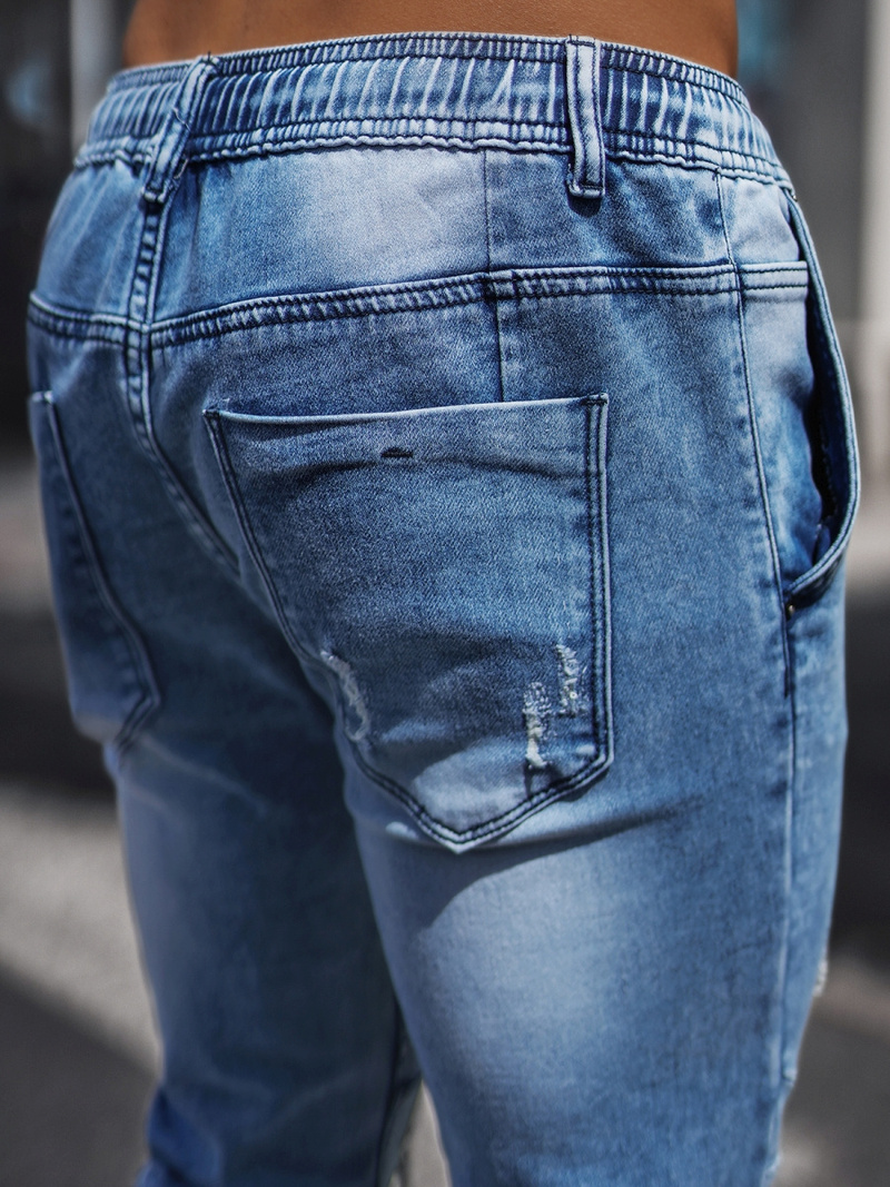 Spodnie jeansowe joggery męskie jasno-niebieskie OZONEE NB/MP0073BC