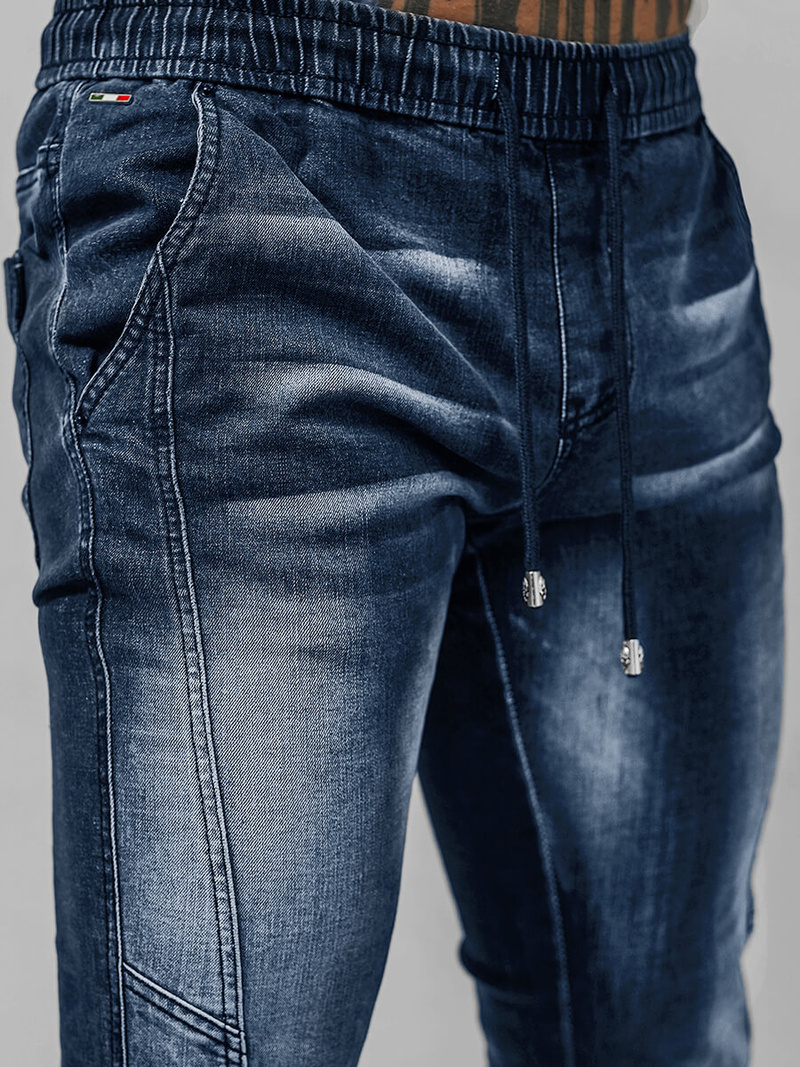 Spodnie jeansowe joggery męskie ciemno-niebieskie OZONEE NB/MP0115BS