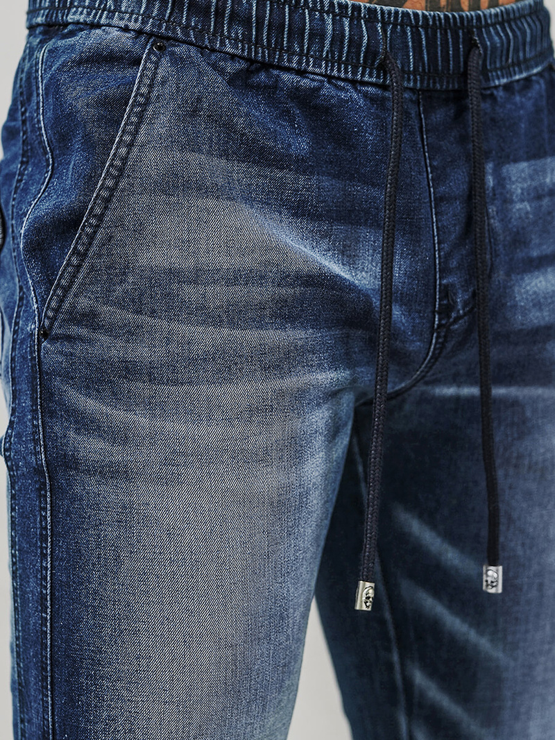 Spodnie jeansowe joggery męskie ciemno-niebieskie OZONEE NB/MP0118BS